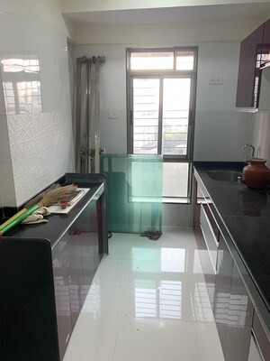 Kitchen in 1 BHK Apartment at Omkar Signet, Malad East – for Rent