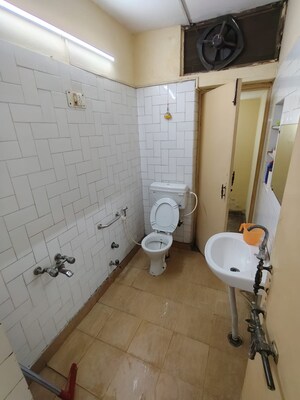 Bathroom in 4 BHK Builder Floor at Green Fields Colony – for Rent