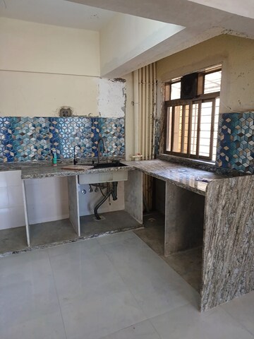 Kitchen in 2 BHK Apartment at Bharat Ecovistas, Shilphata – for Rent