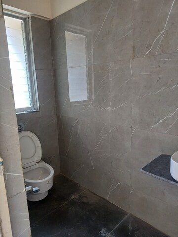 Bathroom in 2 BHK Apartment at Bharat Ecovistas, Shilphata – for Rent