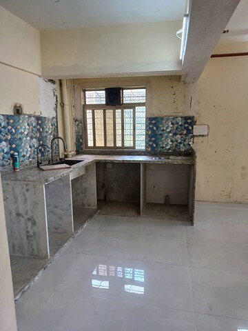 Kitchen in 2 BHK Apartment at Bharat Ecovistas, Shilphata – for Rent