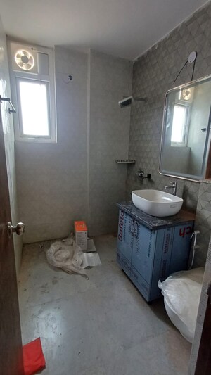 Bathroom in 4 BHK Apartment at Shri Sai Kripa Rainbow Apartments, Sector 43 – for Rent