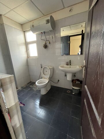 Bathroom in 3 BHK Apartment at Sunworld Vanalika, Sector 107 – for Rent