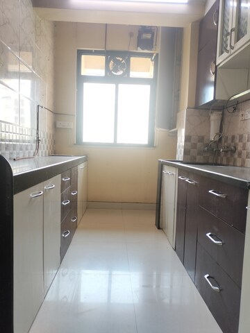 Kitchen in 2 BHK Apartment at Hiranandani Estate, Ghodbunder Road – for Rent
