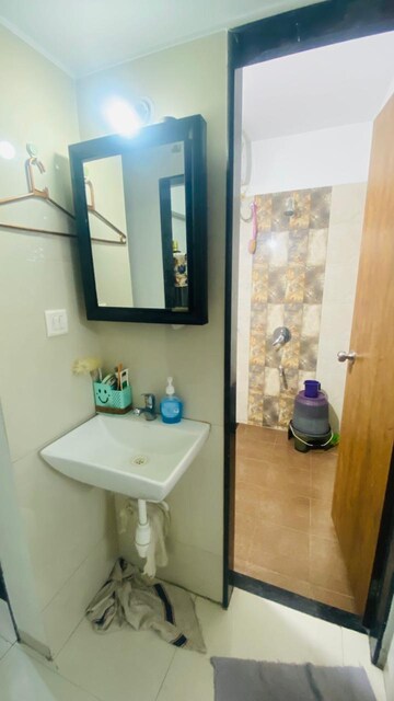 Bathroom in 1 BHK Apartment at Neel Sidhi Infinity, New Panvel – for Rent