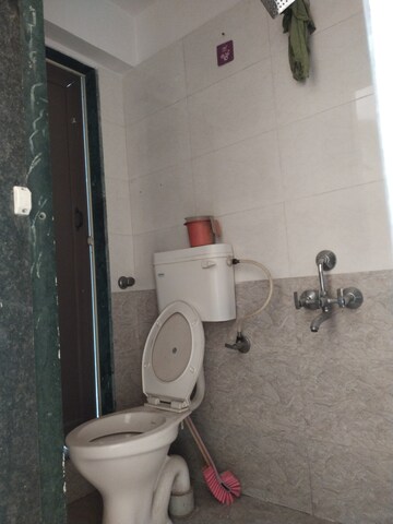 Bathroom in 2 BHK Apartment at Abhishek Trimurti Arcade, Karanjade – for Rent