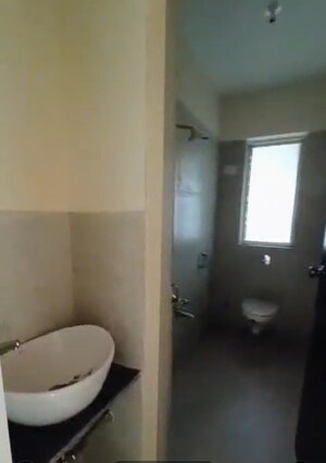 Bathroom in 2 BHK Apartment at Bharat Ecovistas, Shilphata – for Rent