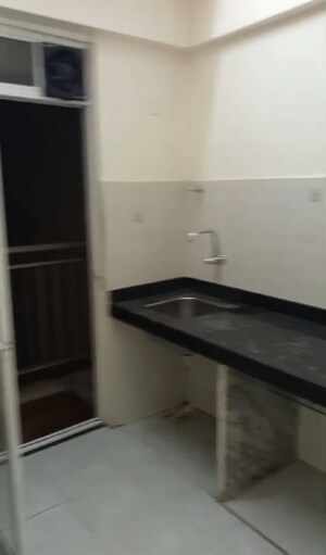 Kitchen in 2 BHK Apartment at Sunrise Glory, Shilphata – for Rent
