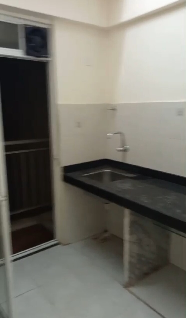Kitchen, sunrise-glory 2 Bedroom 1050 Sq.Ft. Apartment In Shilphata Thane 9312454