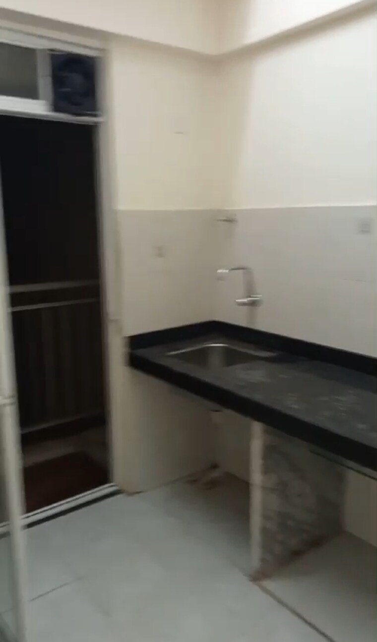 Kitchen, sunrise-glory 2 Bedroom 1050 Sq.Ft. Apartment In Shilphata Thane 9312454
