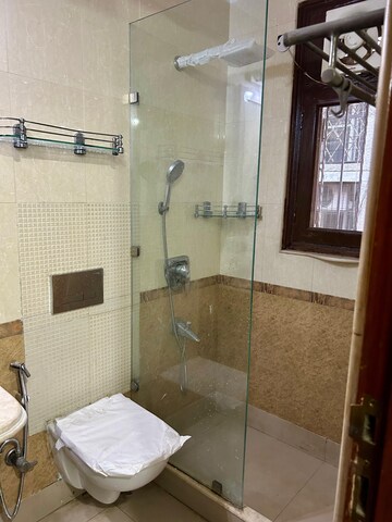 Bathroom in 3 BHK Builder Floor at Defence Colony – for Rent