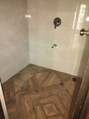 Bathroom in 1 BHK Apartment at Shree Tirupati STG Signature Residency, Patlipada – for Rent