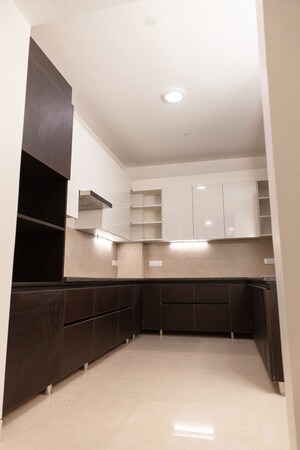 Kitchen in 4 BHK Builder Floor at Palm Residency Chhatarpur, Chattarpur – for Rent