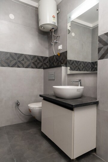 Bathroom in 4 BHK Builder Floor at Palm Residency Chhatarpur, Chattarpur – for Rent