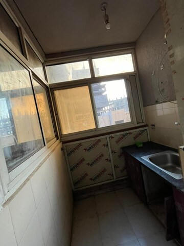 Kitchen in 2 BHK Apartment at Shri Radha Sky Gardens, Sector 16b Greater Noida – for Rent