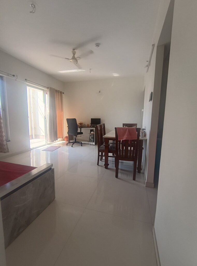 Living Room, bhandari-7-plumeria-drive 2 Bedroom 1200 Sq.Ft. Apartment In Tathawade Pune 9312612