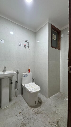 Bathroom in 2 BHK Builder Floor at Chattarpur – for Rent