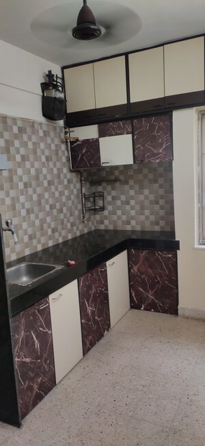 Kitchen in 2 BHK Apartment at Kachnar CHS Vasant Vihar, Vasant Vihar – for Rent