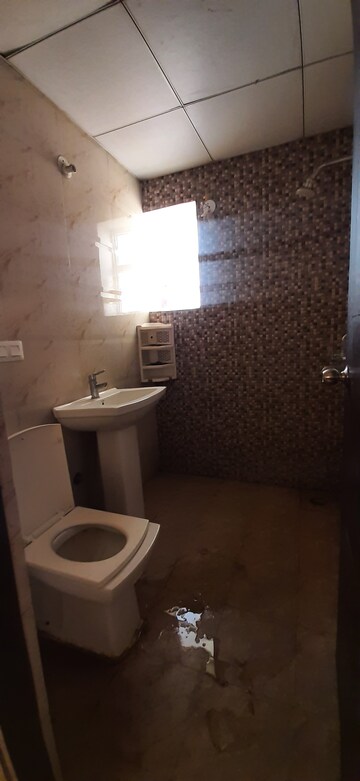 Bathroom in 2 BHK Apartment at Landcraft Golflinks Plaza, Pandav Nagar – for Sale