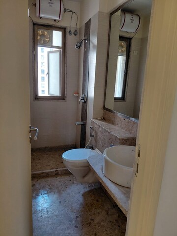 Bathroom in 3 BHK Apartment at Siddhanchal  Phase 2, Manpada – for Rent