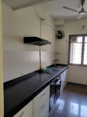Kitchen in 3 BHK Apartment at Siddhanchal  Phase 2, Manpada – for Rent