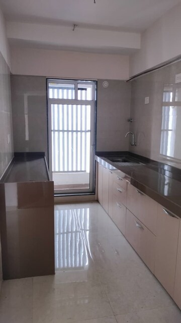 Kitchen in 1 BHK Apartment at Je and Vee Madhuban, Malad East – for Sale