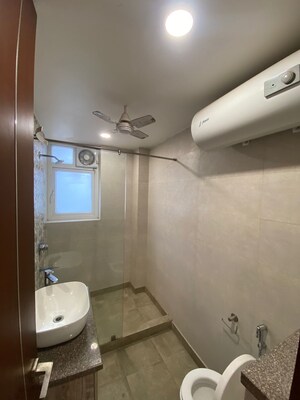 Bathroom in 1 RK Apartment at Unitech Uniworld Gardens 2, Sector 47 – for Rent