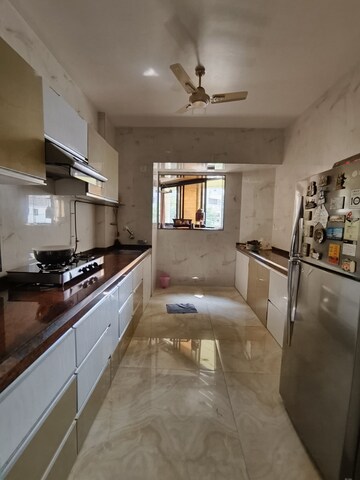 Kitchen in 2 BHK Apartment at Happy Valley, Manpada – for Sale