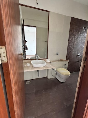 Bathroom in 2 BHK Apartment at Omkar Alta Monte, Malad East – for Rent