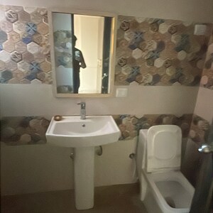 Bathroom in 2 BHK Apartment at Landcraft Golflinks Plaza, Pandav Nagar – for Rent