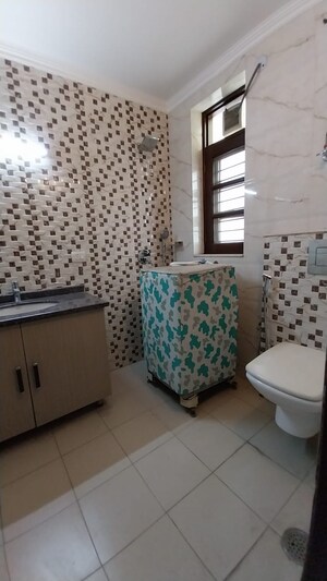Bathroom in 3 BHK Apartment at Defence Colony – for Rent