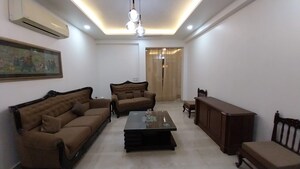 Living Room in 3 BHK Apartment at Defence Colony – for Rent