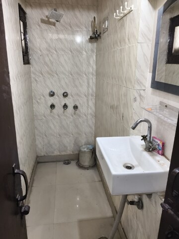 Bathroom in Studio Apartment at Dwarka – for Sale