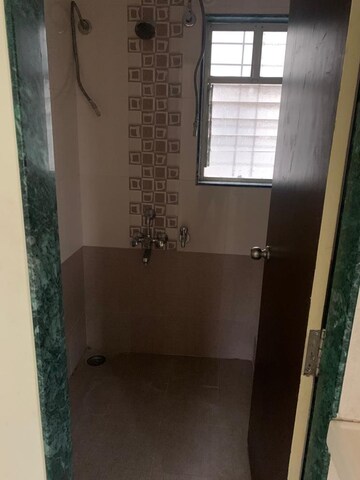 Bathroom in 3 BHK Apartment at Signet Yogeshwar CHS, Dahanukar Colony – for Rent