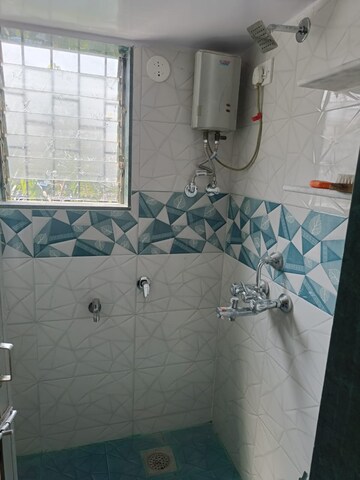Bathroom in 1 BHK Apartment at Madhukunj CHS, Andheri East – for Rent
