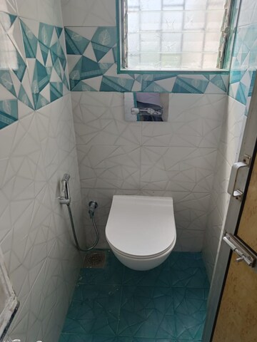 Bathroom in 1 BHK Apartment at Madhukunj CHS, Andheri East – for Rent