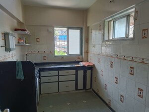 Kitchen in 1 BHK Apartment at Madhukunj CHS, Andheri East – for Rent