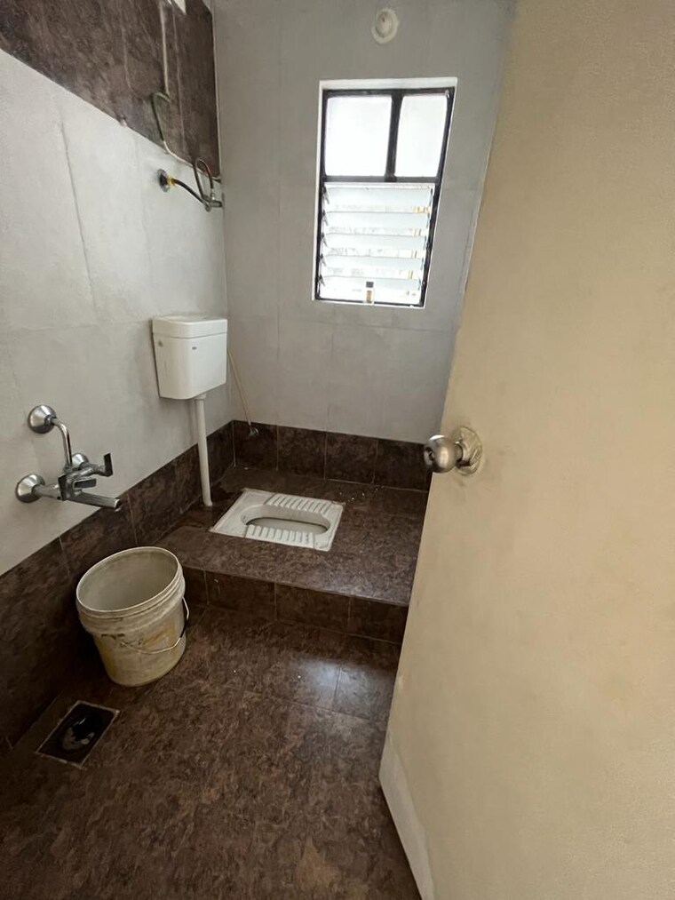 Bathroom, nirman-nisarga 2 Bedroom 900 Sq.Ft. Apartment In Bhusari Colony Pune 9313484
