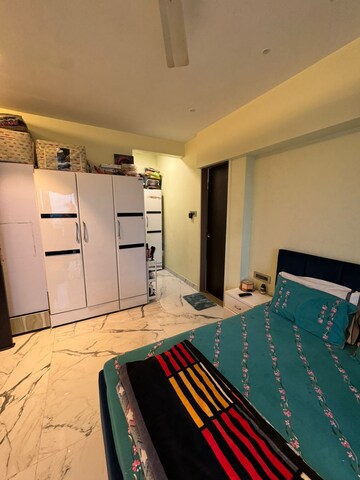 Bedroom in 3 BHK Apartment at RNA NG Eclat, Andheri West – for Rent