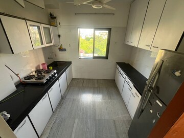 Kitchen in 2 BHK Apartment at Dariya Darshan, Andheri West – for Rent
