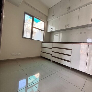 Kitchen in 3 BHK Apartment at Samridhi Luxuriya Avenue, Sector 150 – for Rent