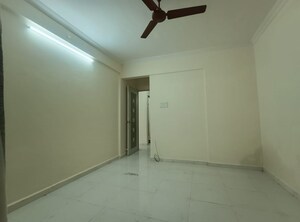 Room in 2 BHK Apartment at Seawoods – for Rent