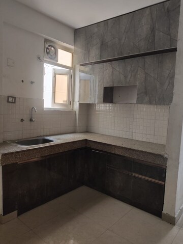 Kitchen in 3.5 BHK Builder Floor at Smart World Gems, Sector 89 – for Rent