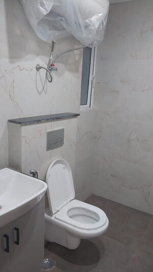 Bathroom in 3.5 BHK Builder Floor at Smart World Gems, Sector 89 – for Rent