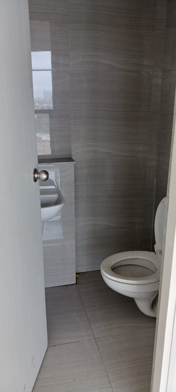 Bathroom in 1 BHK Apartment at Runwal Gardens Phase 2, Dombivli East – for Sale