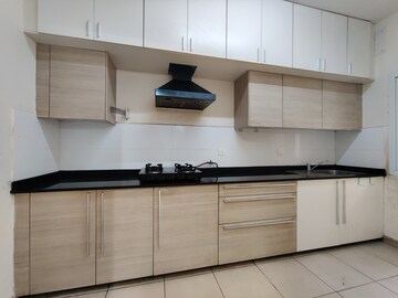 Kitchen in 2.5 BHK Apartment at Bhartiya Nikoo Homes, Thanisandra Main Road – for Rent