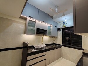 Kitchen in 2.5 BHK Builder Floor at Oberoi Realty Woods, Goregaon East – for Sale