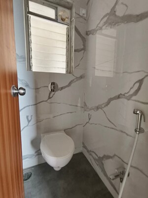 Bathroom in 1 BHK Apartment at Raunak Bliss, Ghodbunder Road – for Rent