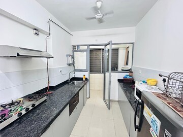 Kitchen in 2 BHK Apartment at Amanora Future Towers, Hadapsar – for Rent