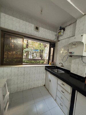 Kitchen in 1 BHK Apartment at Bandra West – for Rent